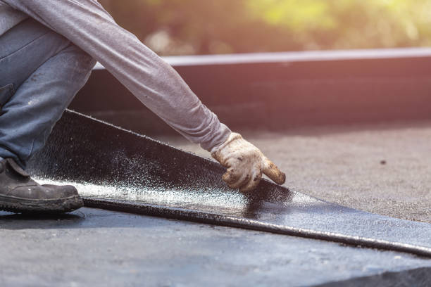Professional Basement Waterproofing technician working in Jarrettsville, MD